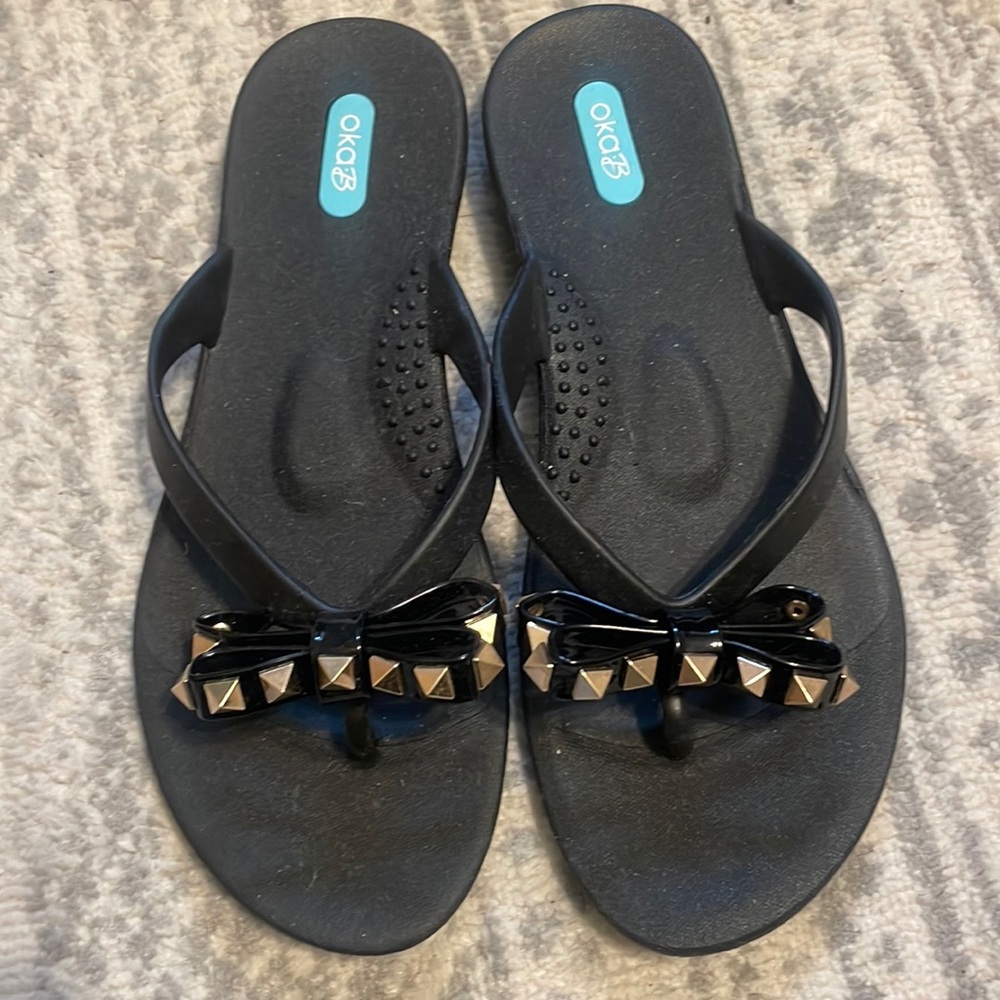 OKA b jelly flip flops